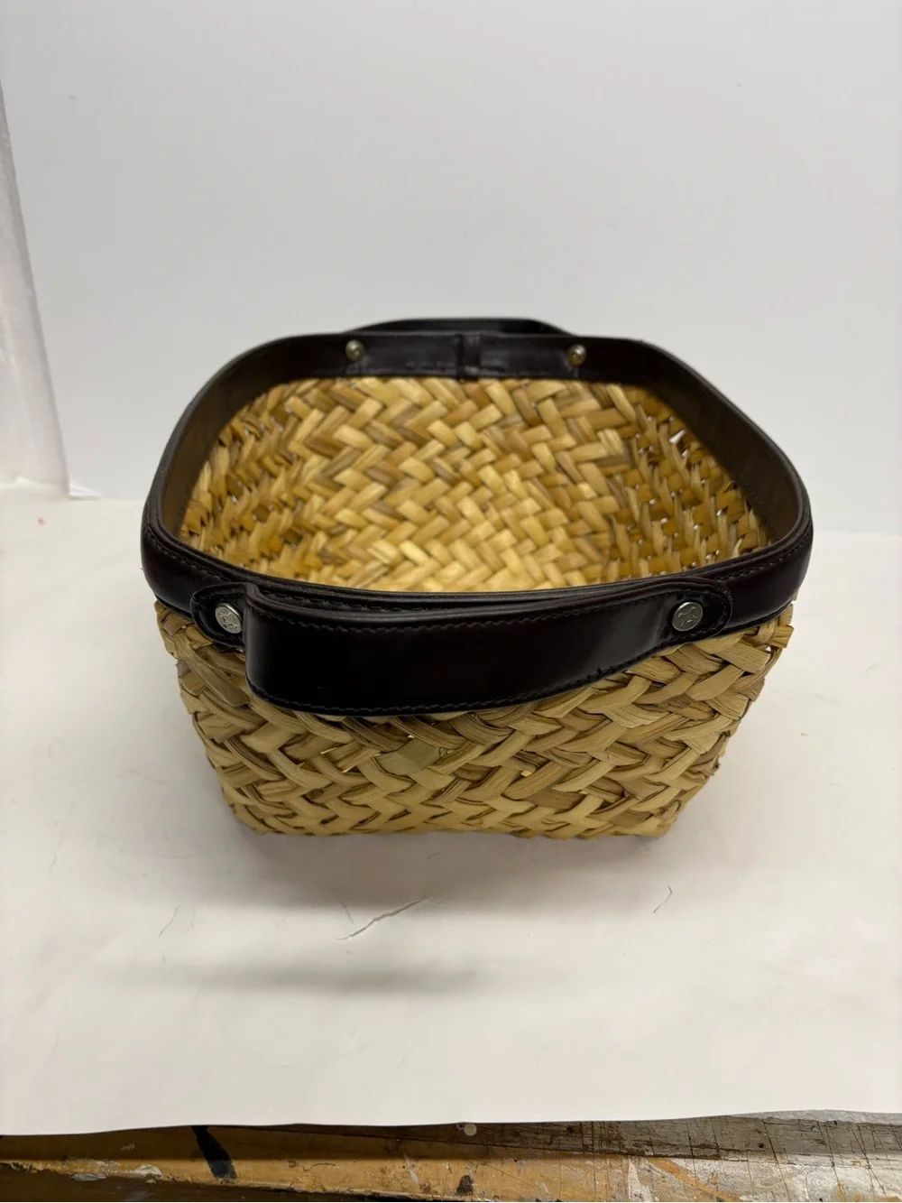 Woven Straw Handled Basket with Dark Brown Leather Trim 14x10x6.5”